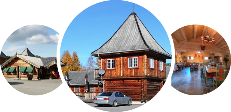 Finnskogen Kro og Motell — hovedbygning i laftet tømmer, med uteområde og skog i bakgrunnen